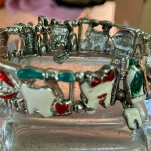 Vintage dental charm bracelet with toothpaste. toothbrushes,  smiles, etc